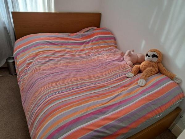 Image 1 of Ikea Wood Double Bed with Mattress.