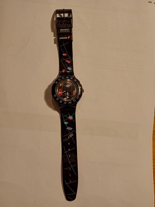 Preview of the first image of Swatch access Swiss air watch.