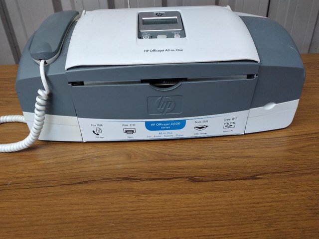 Preview of the first image of HP Offficejet phone / printer / fax / scanner.