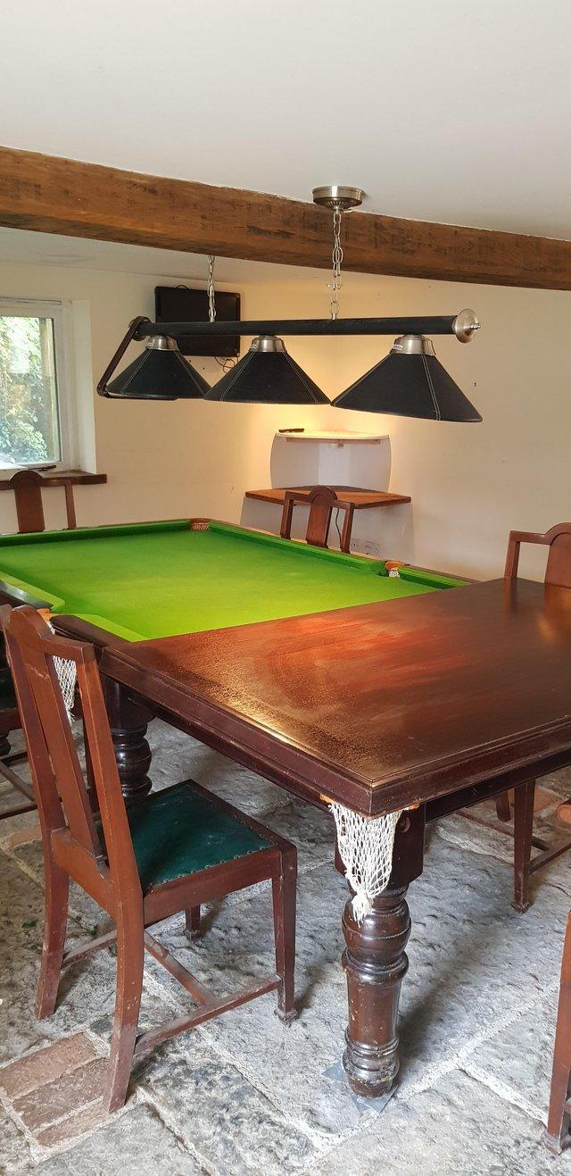 Preview of the first image of Snooker/pool/dining table with 10 chairs.
