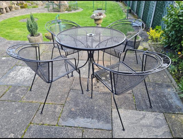 Preview of the first image of Metal garden table and chairs..