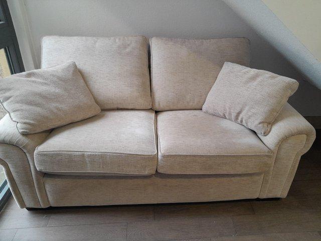 Preview of the first image of Free 2 seater sofa cream.