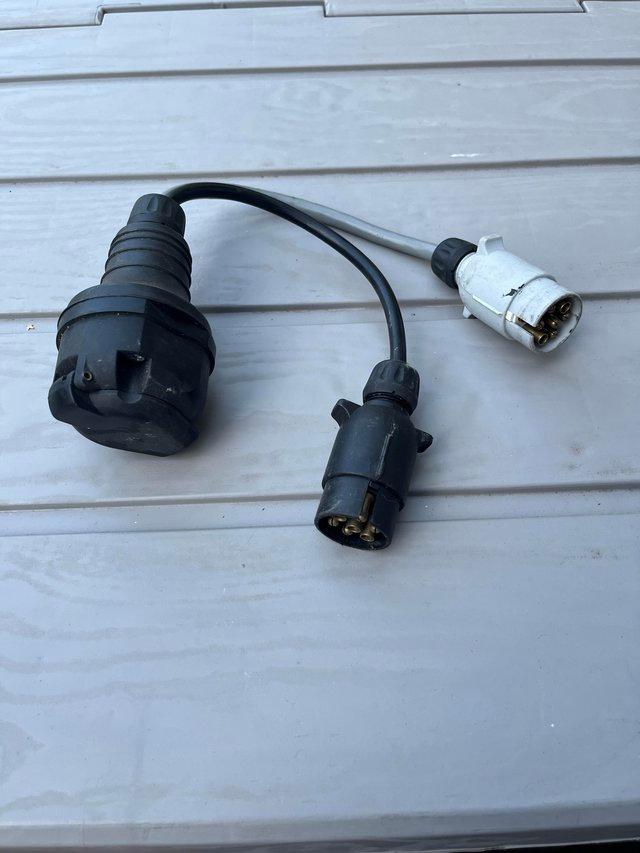 Preview of the first image of Twin electrics adapter for caravan or trailer.