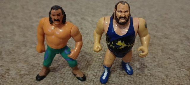 Preview of the first image of wwf wrestling action figure jake the snake & earthquake.