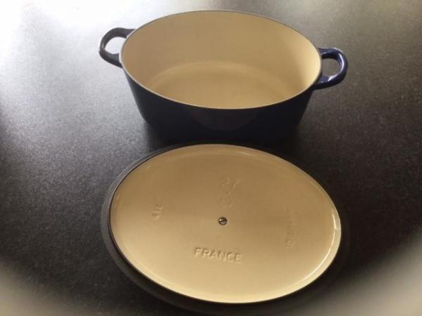 Image 1 of OVAL SHAPED CASSEROLE BY LE CREUSET.