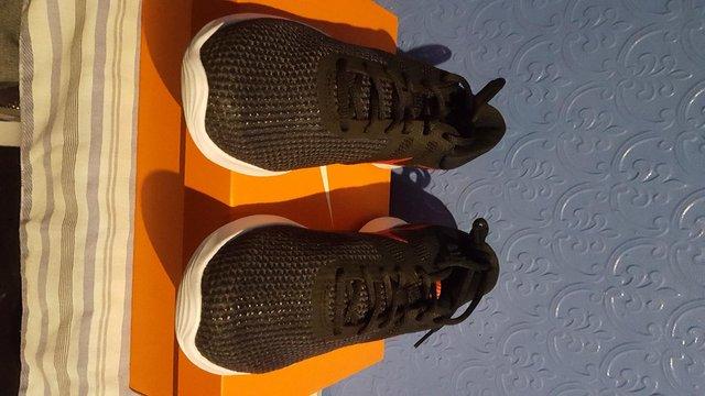 Preview of the first image of Mens Nike Revolution Trainers size 8.Brand New/Boxed.