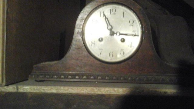 Preview of the first image of Mantle clock clock for sale, 1 empty cabinet also.