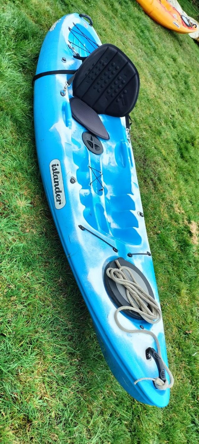 Preview of the first image of Islander Calypso sit on top kayak In blue and white.