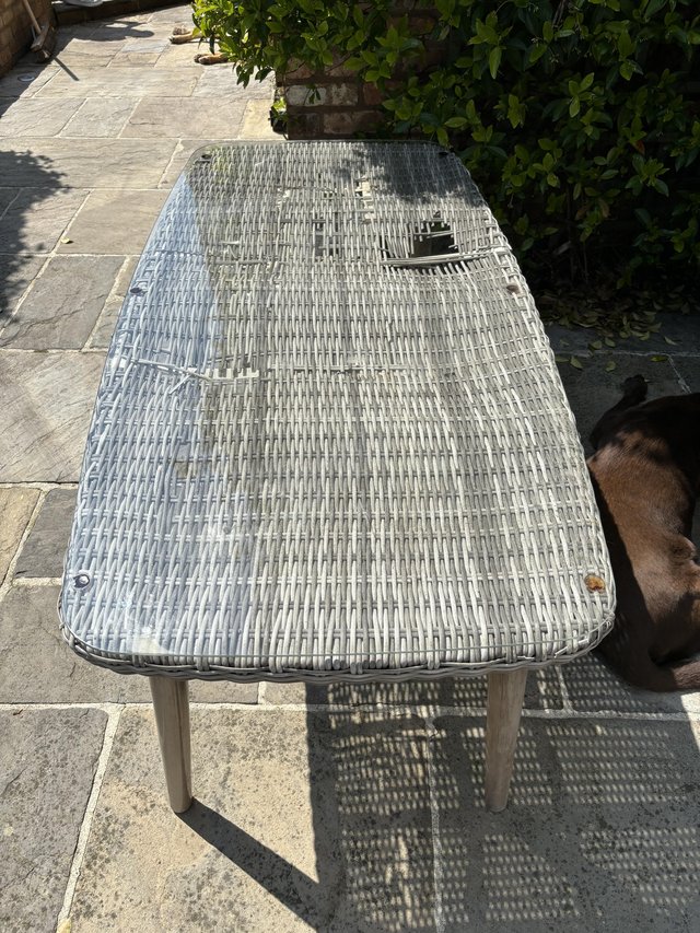 Preview of the first image of Patio table with glass top.