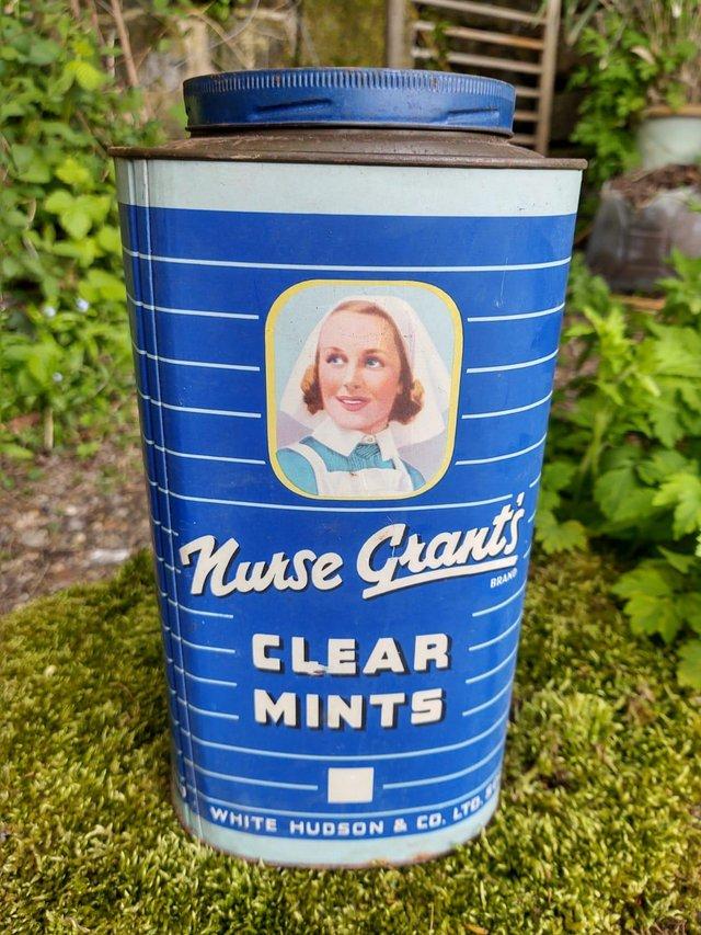 Preview of the first image of large Vintage Shop Advertising Tin.