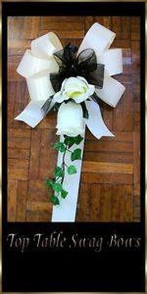 Preview of the first image of 6 Sharon Ivory Double Rose Wedding Pew Decorations.