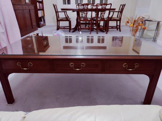 Preview of the first image of Rosewood coffee table - excellent condition.