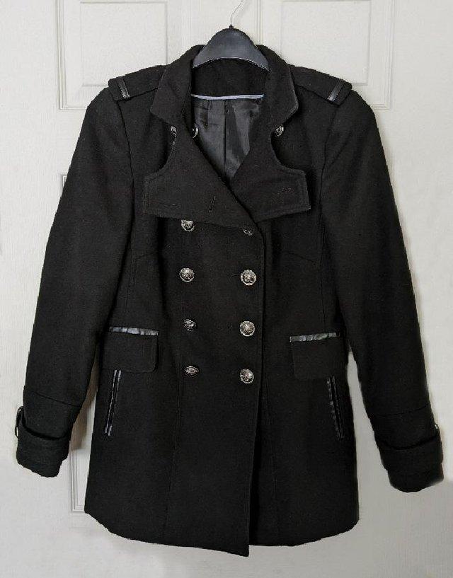 Preview of the first image of Lovely Ladies Military Style Black Coat - Size 10.