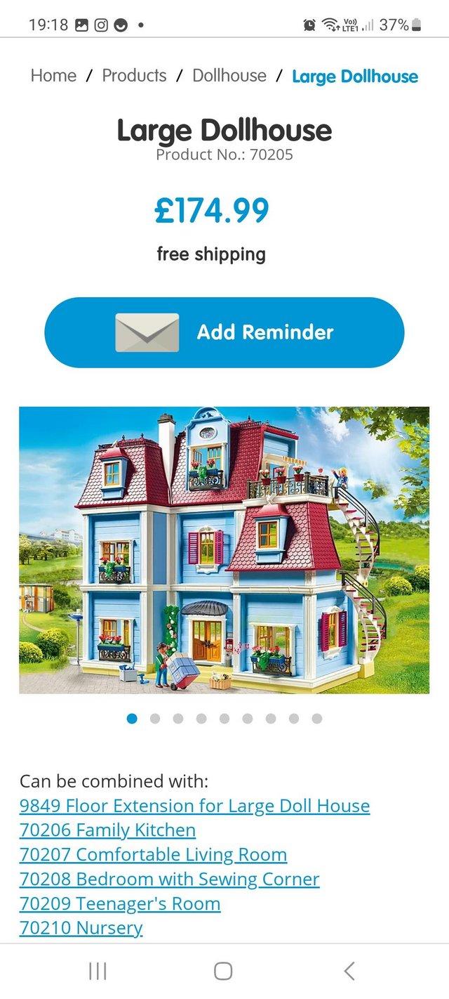 Preview of the first image of Playmobil dolls house with extra furniture sets.
