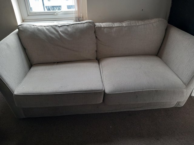 Preview of the first image of Large cushioned three seater sofa.