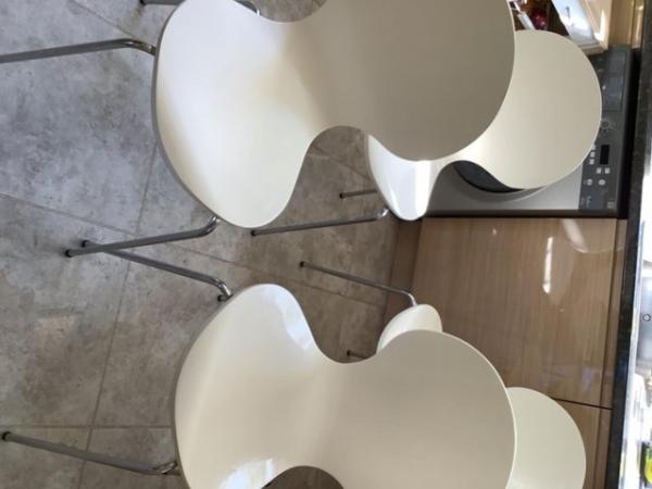 Image 1 of 4 white chairs with chrome legs