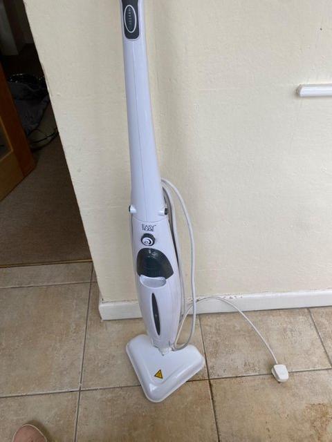 Preview of the first image of Electric Steam floor cleaner with 2 pads for hard floors.