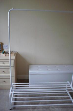 Image 1 of Clothes rack with bottom storage space