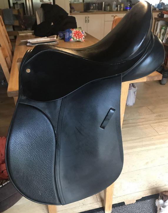 Preview of the first image of Black English leather GP 16 1/2 inch saddle. Wide.