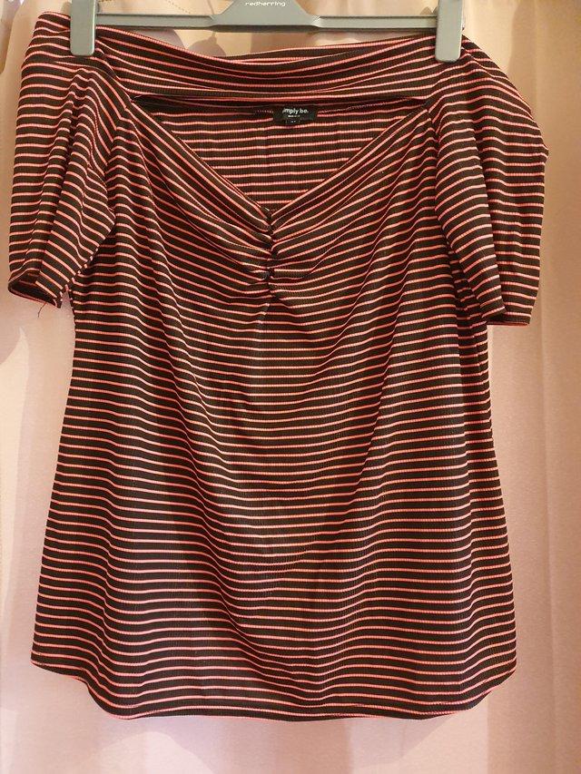 Preview of the first image of Plus size pink & black striped off shoulder top, size 24.