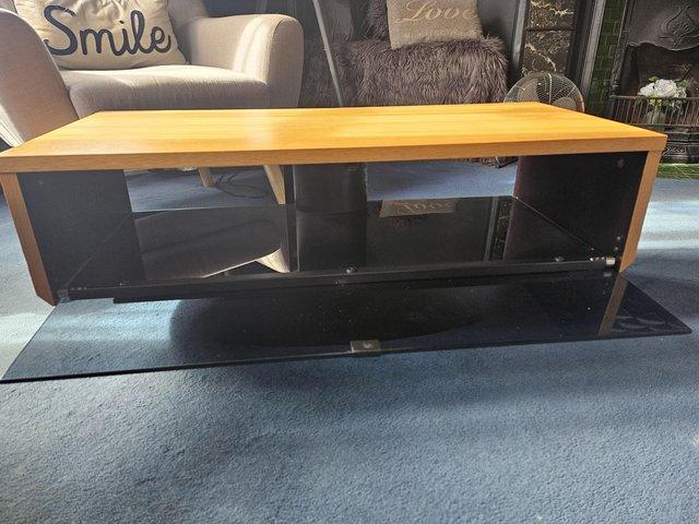 Preview of the first image of Glass fronted TV stand....