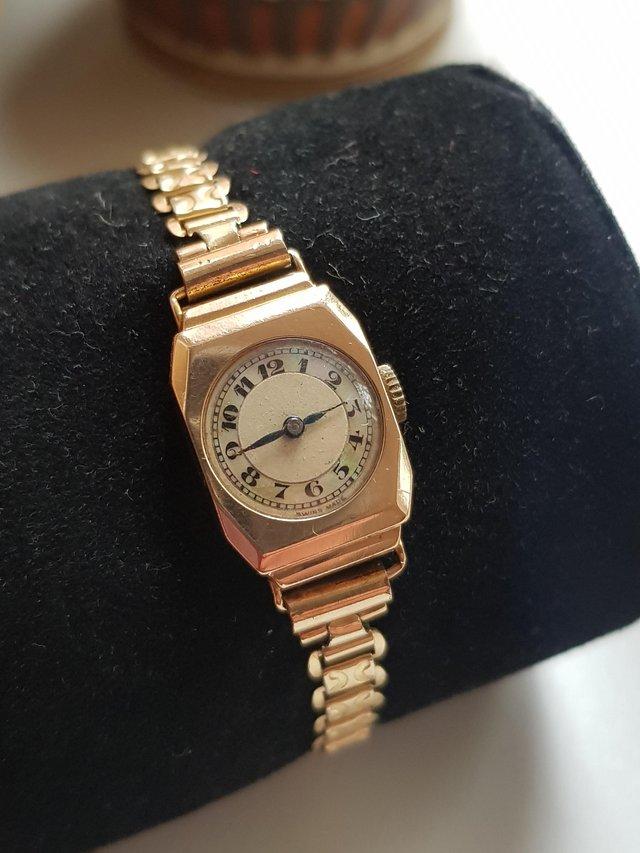 Preview of the first image of ladies 1936 glasgow 9 carat gold watch mother of pearl dial.