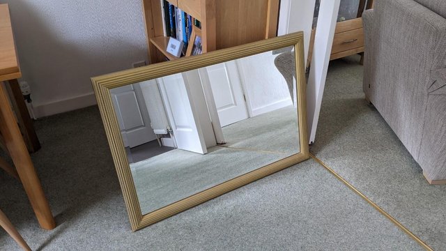 Preview of the first image of Large Modern Wall Mirror with gold/gilt frame.