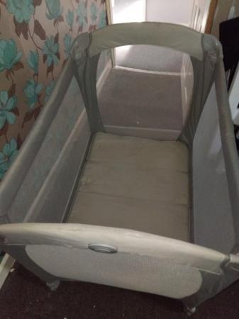 Image 1 of Travel cot with bassinet plus storage bag
