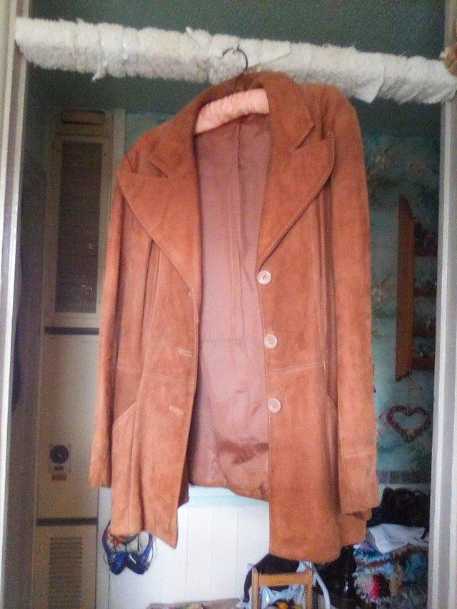 Preview of the first image of Vintage tan suede jacket size 14/16.