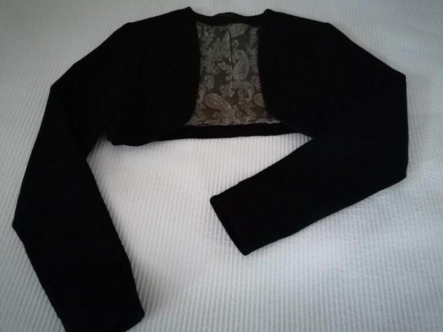 Preview of the first image of LADIES BLACK BOLERO JACKET 10 UK.