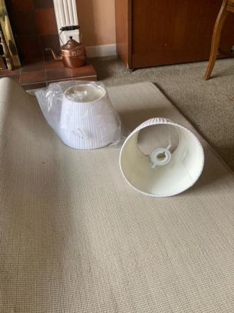 Image 1 of Two white, pleated material lampshades