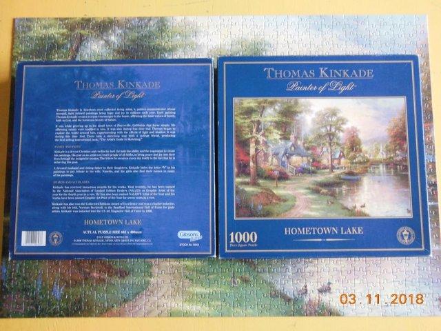 Preview of the first image of THOMAS KINKADE 1000 PIECE JIGSAW PUZZLE. HOMETOWN LAKE.