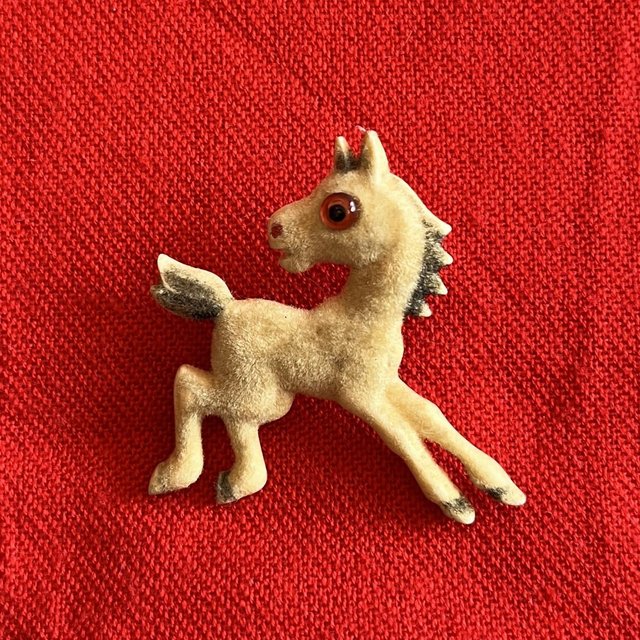 Preview of the first image of Vintage 1960's flock-covered plastic horse brooch. Can post..