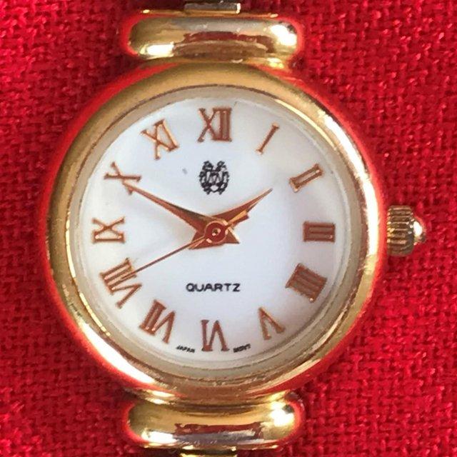 Preview of the first image of Vintage St Michael womans quartz battery watch.New battery?.