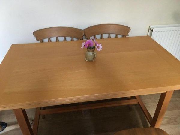 Image 1 of Extending Ikea solid wood dining table