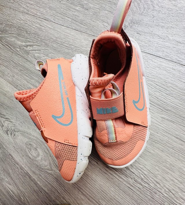 Preview of the first image of Nike little runner shoes , pink I think ??.