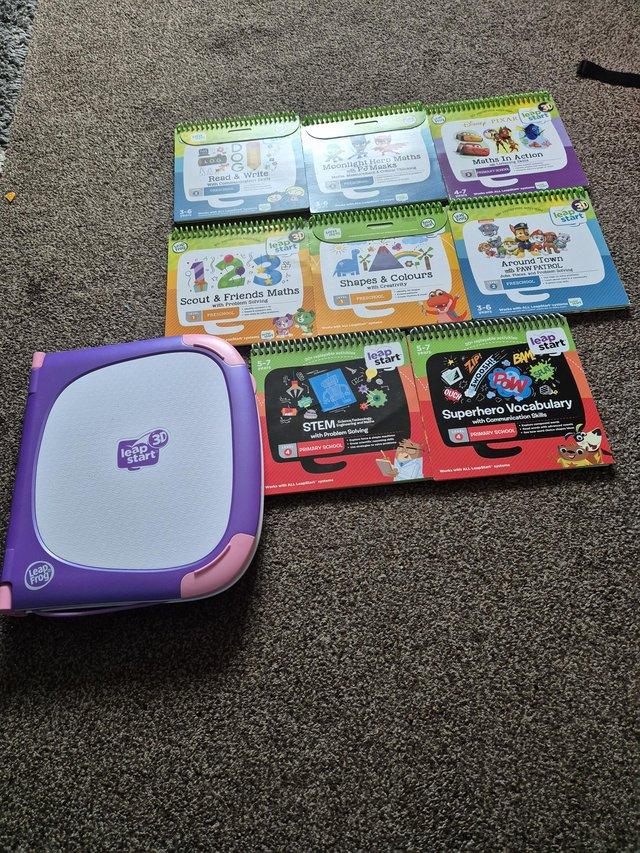 Preview of the first image of Leapfrog Leapstart 3D with various books.