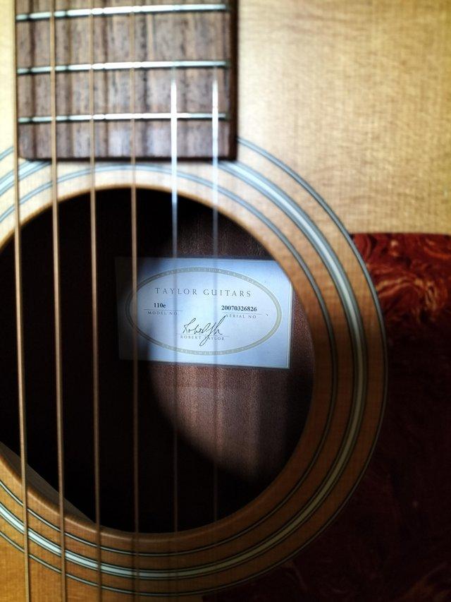 Preview of the first image of Taylor 110 E acoustic guitar in excellent condition.