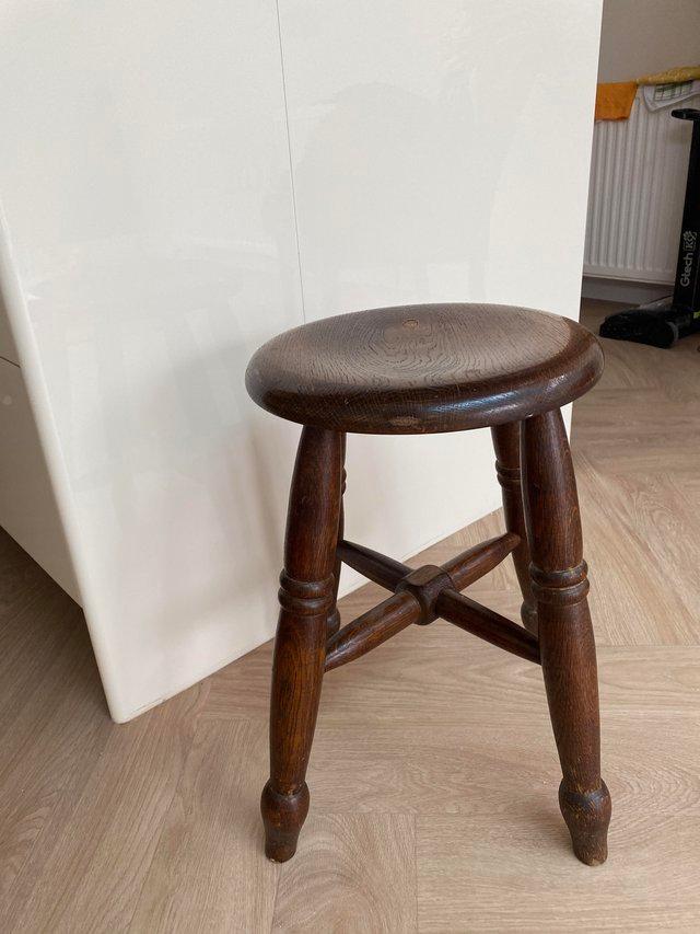 Preview of the first image of used wooden kitchen stool.height 46cm.