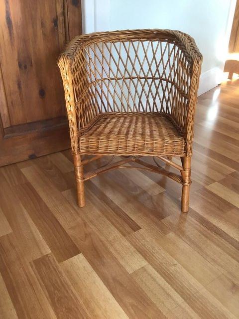 Preview of the first image of CHILDS WICKER CHAIR.......