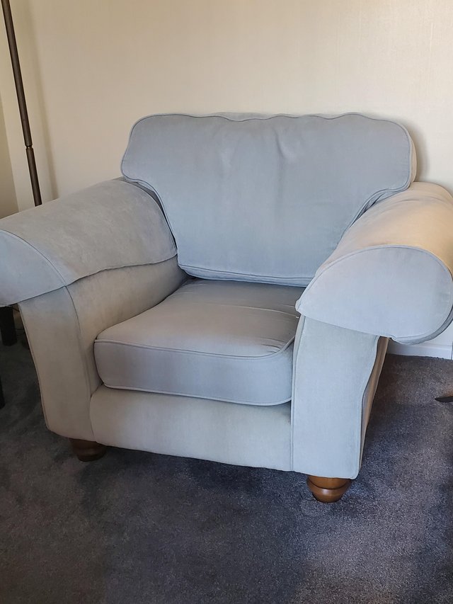 Preview of the first image of Armchair in pale blue  ,good condition.