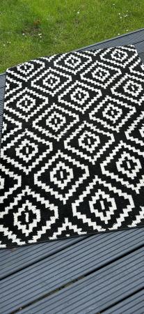 Image 2 of Black and white rug used condition