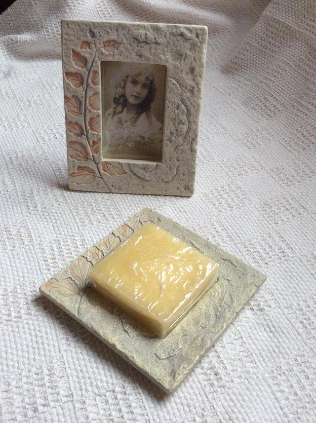 Preview of the first image of CERAMIC PICTURE FRAME & MATCHING CANDLE HOLDER.