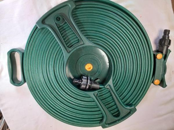 Image 2 of Flat hose reel cassette and waste pipe system