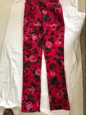 Image 2 of Unusual Stretch Floral trousers size 38 pink background