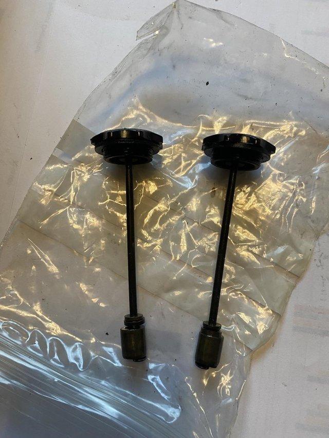 Preview of the first image of Pair of SU carburettor dash pot dampers.