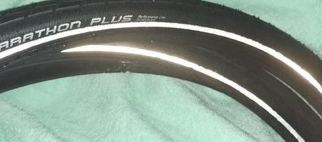 Preview of the first image of Pair - New Schwalbe marathon plus bike tyres 700x38c reflex.