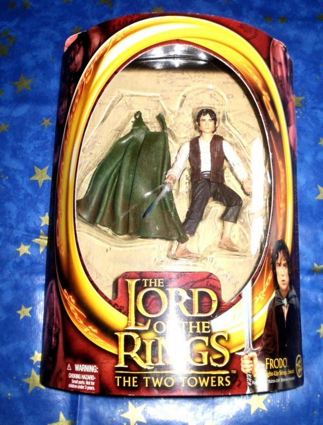 Preview of the first image of Lord of the Rings boxed Figure Frodo Toy Biz never been open.