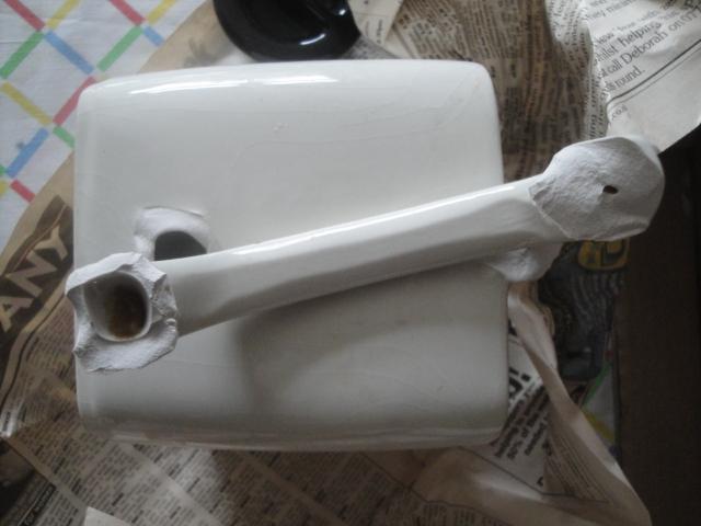 Preview of the first image of Squarish "White" Used Teas-made Teapot with Parted Handle..