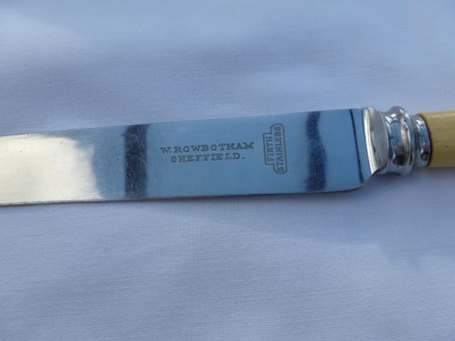 Preview of the first image of Dozen vintage stainless steel (Sheffield) Dinner knives.